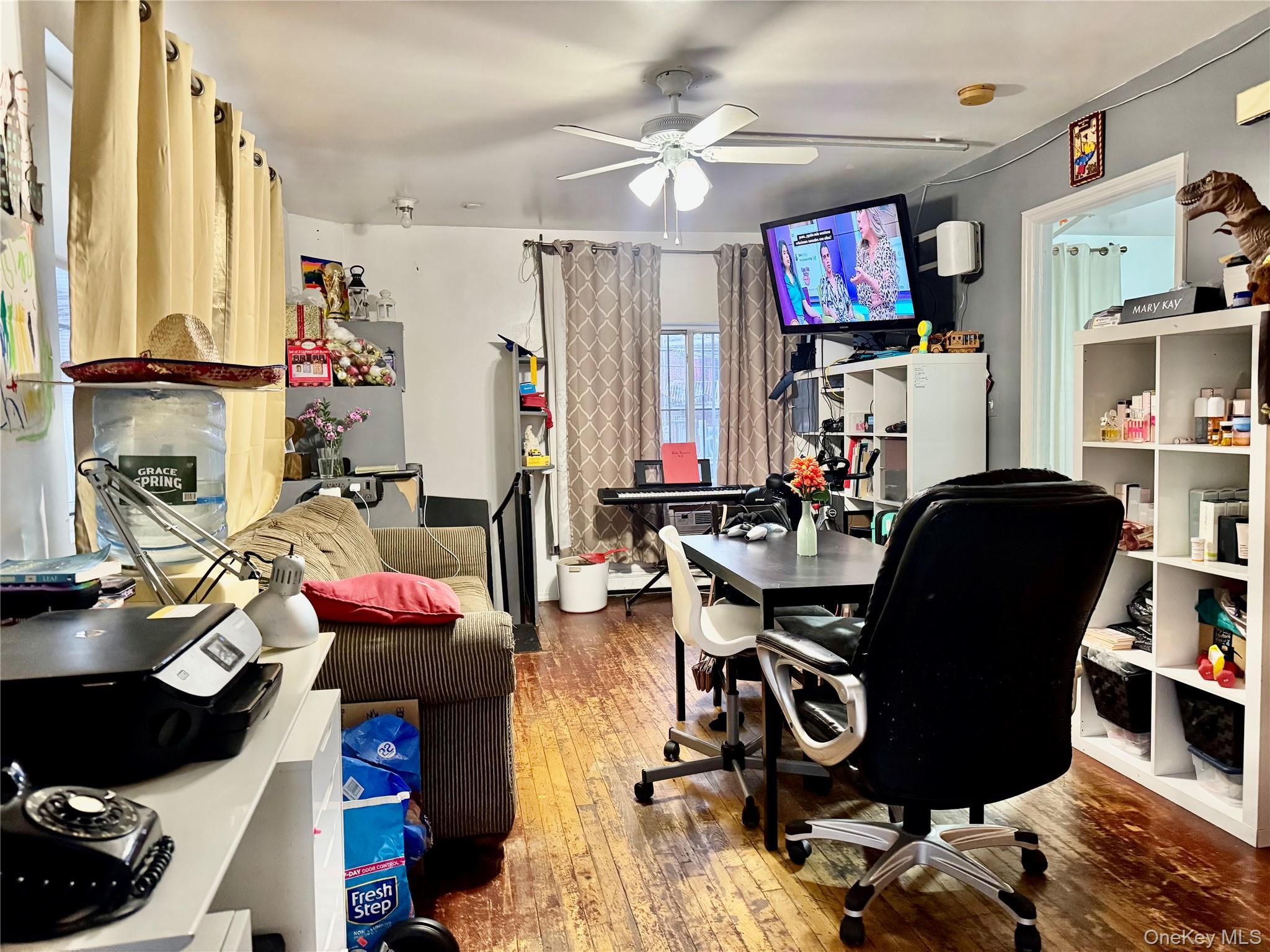 103-25 Alstyne Avenue Queens, NY 11368 - Photo 20 of 22 a view of a workspace with furniture and a window
