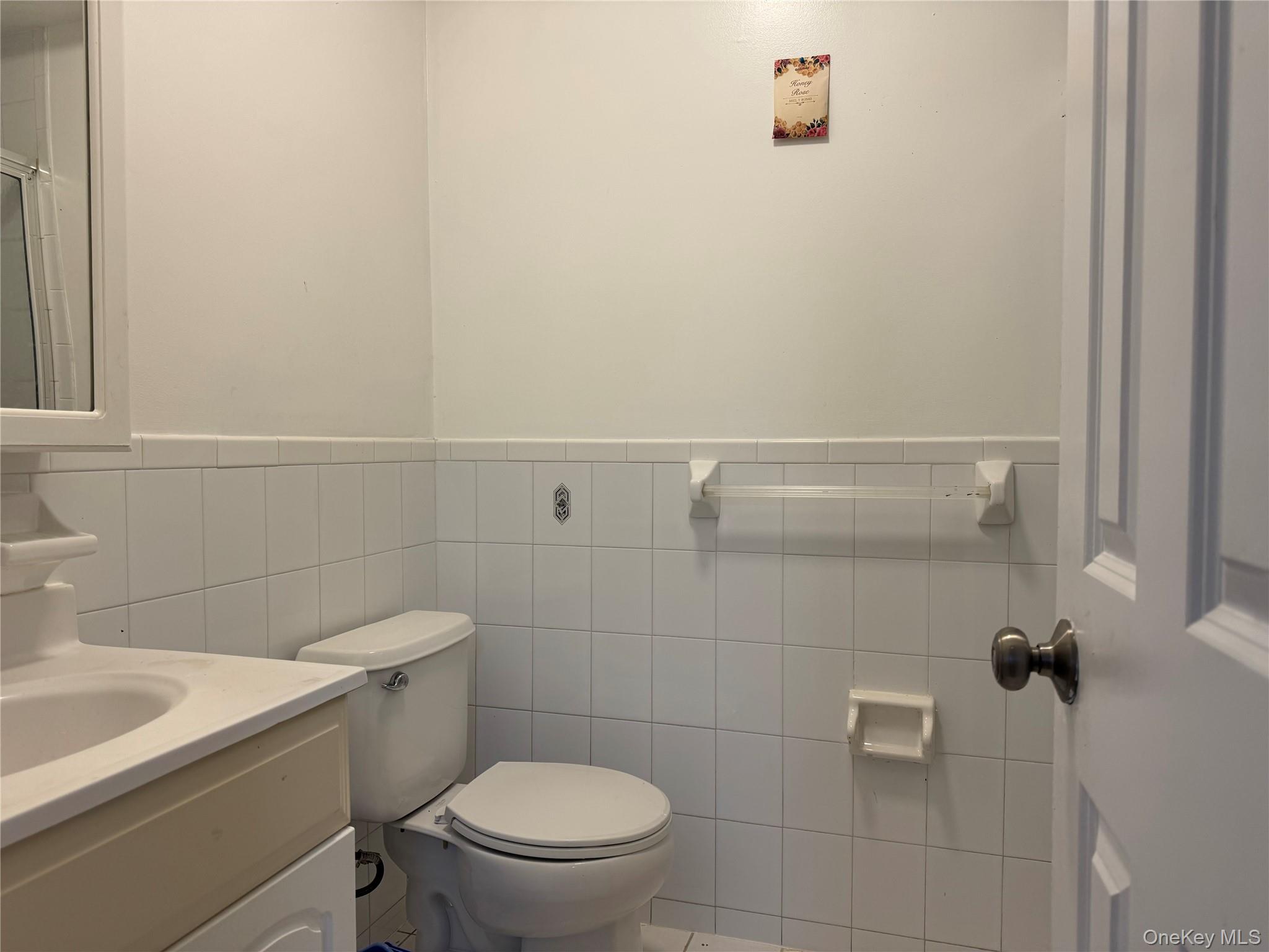 103-25 Alstyne Avenue Queens, NY 11368 - Photo 2 of 22 a bathroom with a toilet and a shower