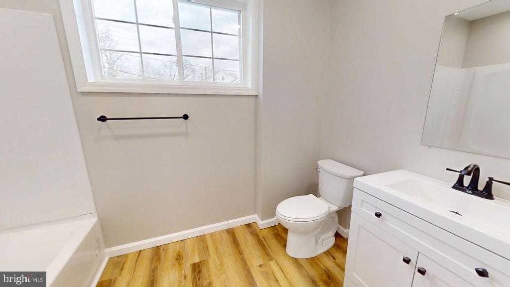 10 Linden Street Bridgeton, NJ 08302 - Photo 32 of 89 a bathroom with a sink and a toilet