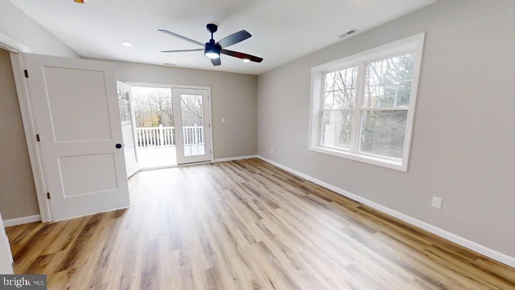 10 Linden Street Bridgeton, NJ 08302 - Photo 40 of 89 a view of an empty room with wooden floor and a window