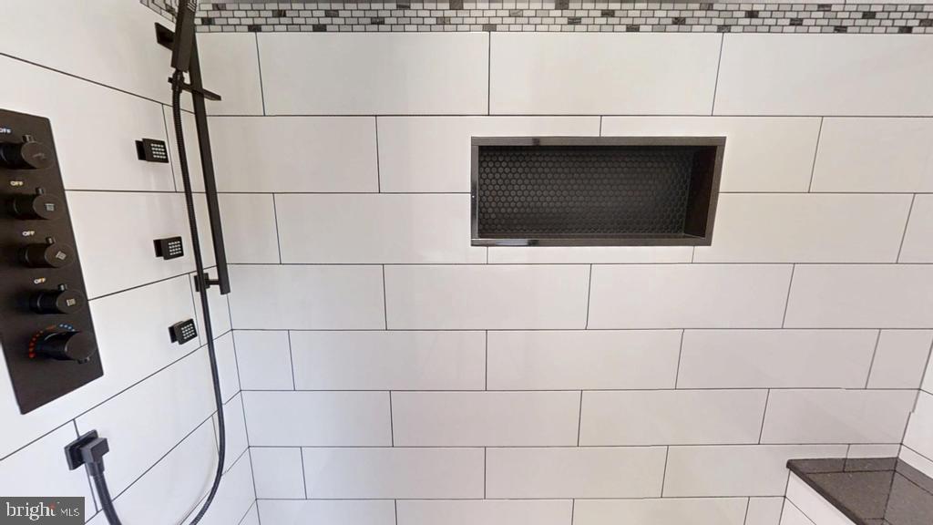 10 Linden Street Bridgeton, NJ 08302 - Photo 42 of 89 a bathroom with a sink a toilet and a shower