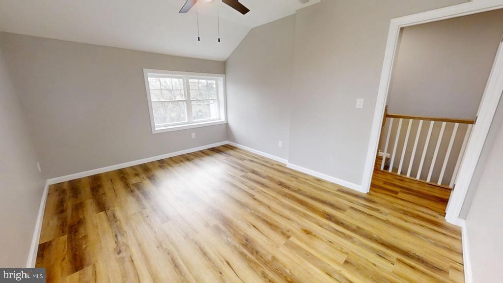 10 Linden Street Bridgeton, NJ 08302 - Photo 53 of 89 a view of an empty room with wooden floor and a window