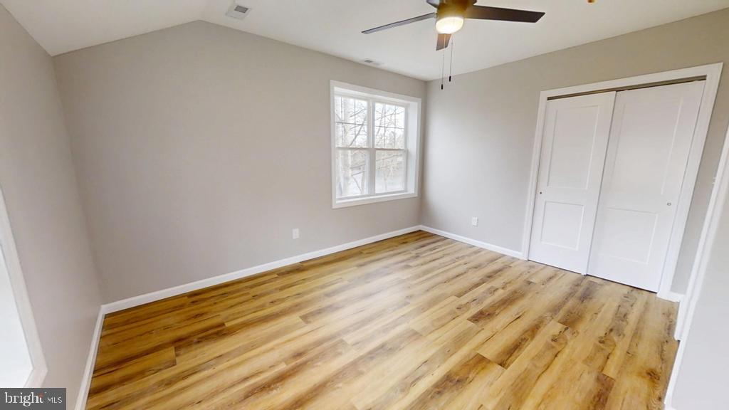 10 Linden Street Bridgeton, NJ 08302 - Photo 56 of 89 a view of empty room with window and ceiling fan