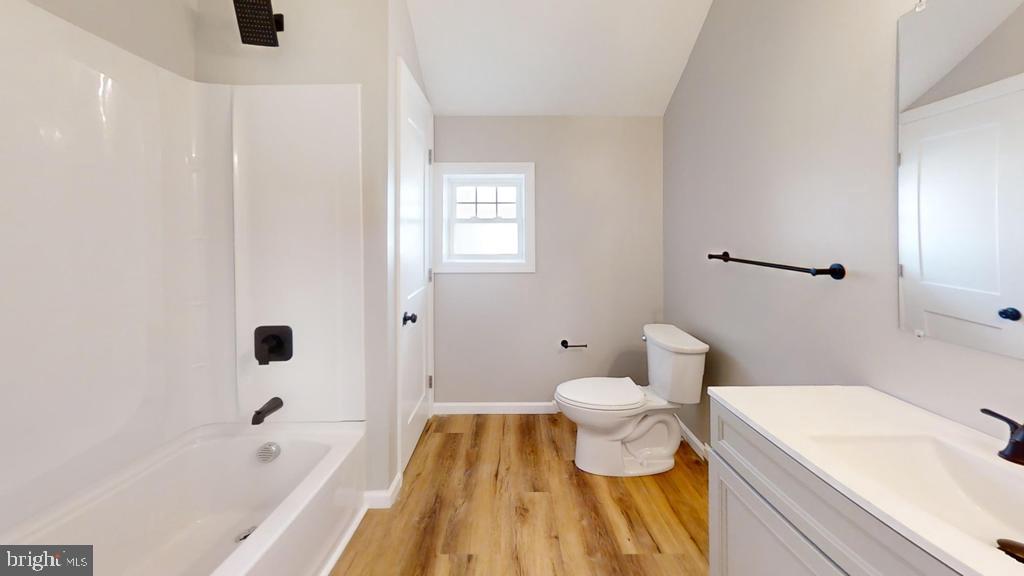 10 Linden Street Bridgeton, NJ 08302 - Photo 79 of 89 a bathroom with a sink toilet bathtub and vanity