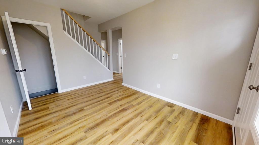 10 Linden Street Bridgeton, NJ 08302 - Photo 9 of 89 a view of a room with wooden floor and stairs