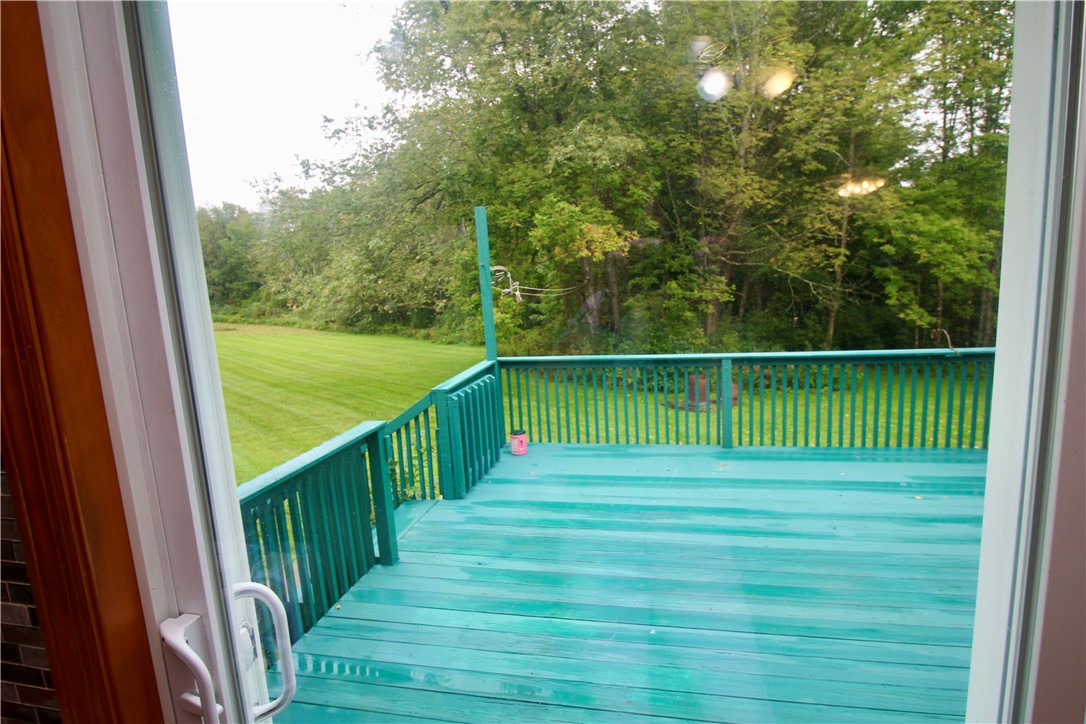 178 Windham Road Smithville, NY 13778 - Photo 7 of 27 Sliding doors to back deck. Has electric awning.