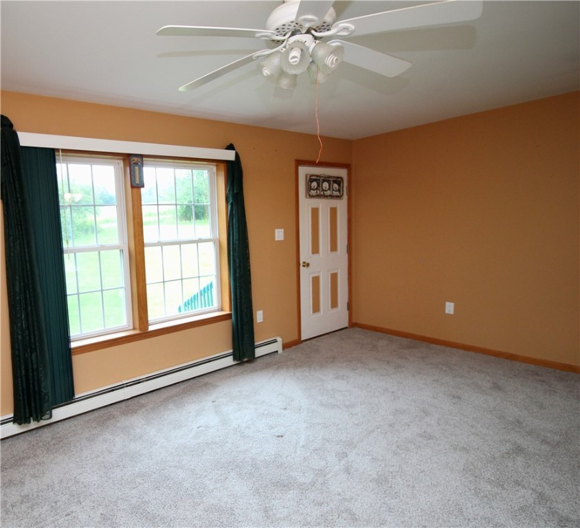 178 Windham Road Smithville, NY 13778 - Photo 8 of 27 Living Room - Egress door to front deck.