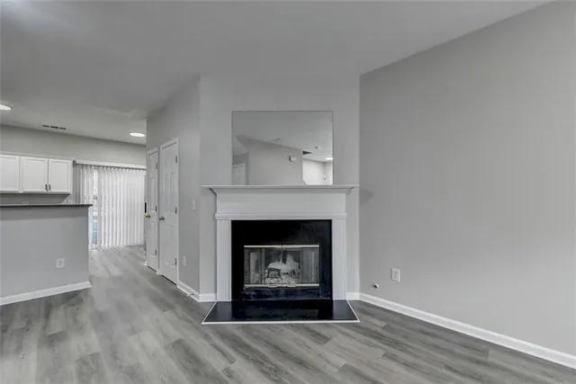 a living room with a fireplace