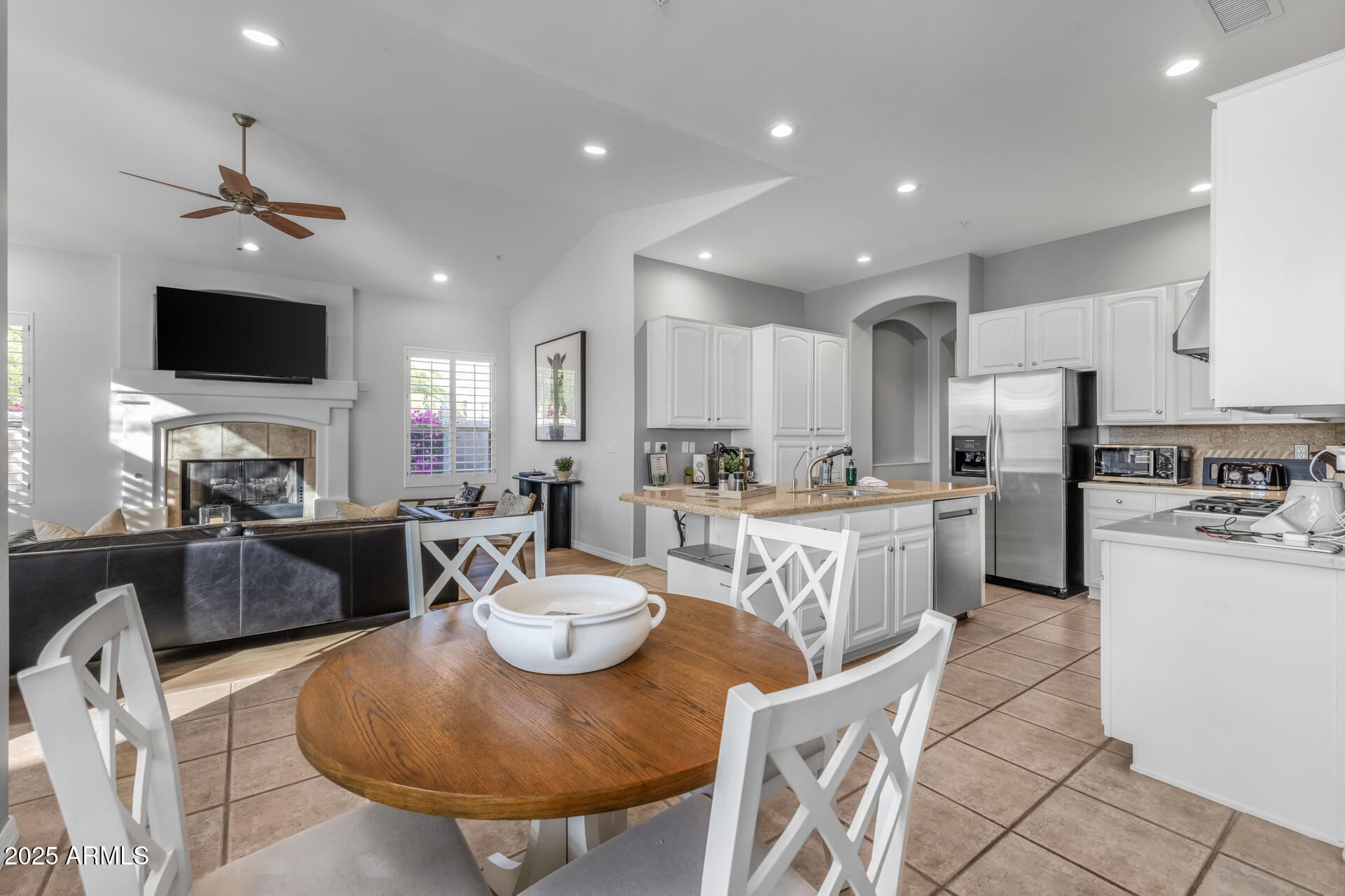 7474 East Red Bird Road Scottsdale, AZ 85266 - Photo 15 of 40 a view of kitchen with windows and chairs
