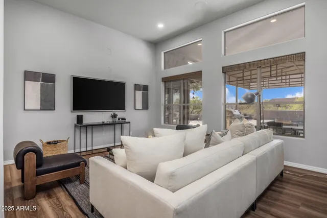 a living room with furniture and a table