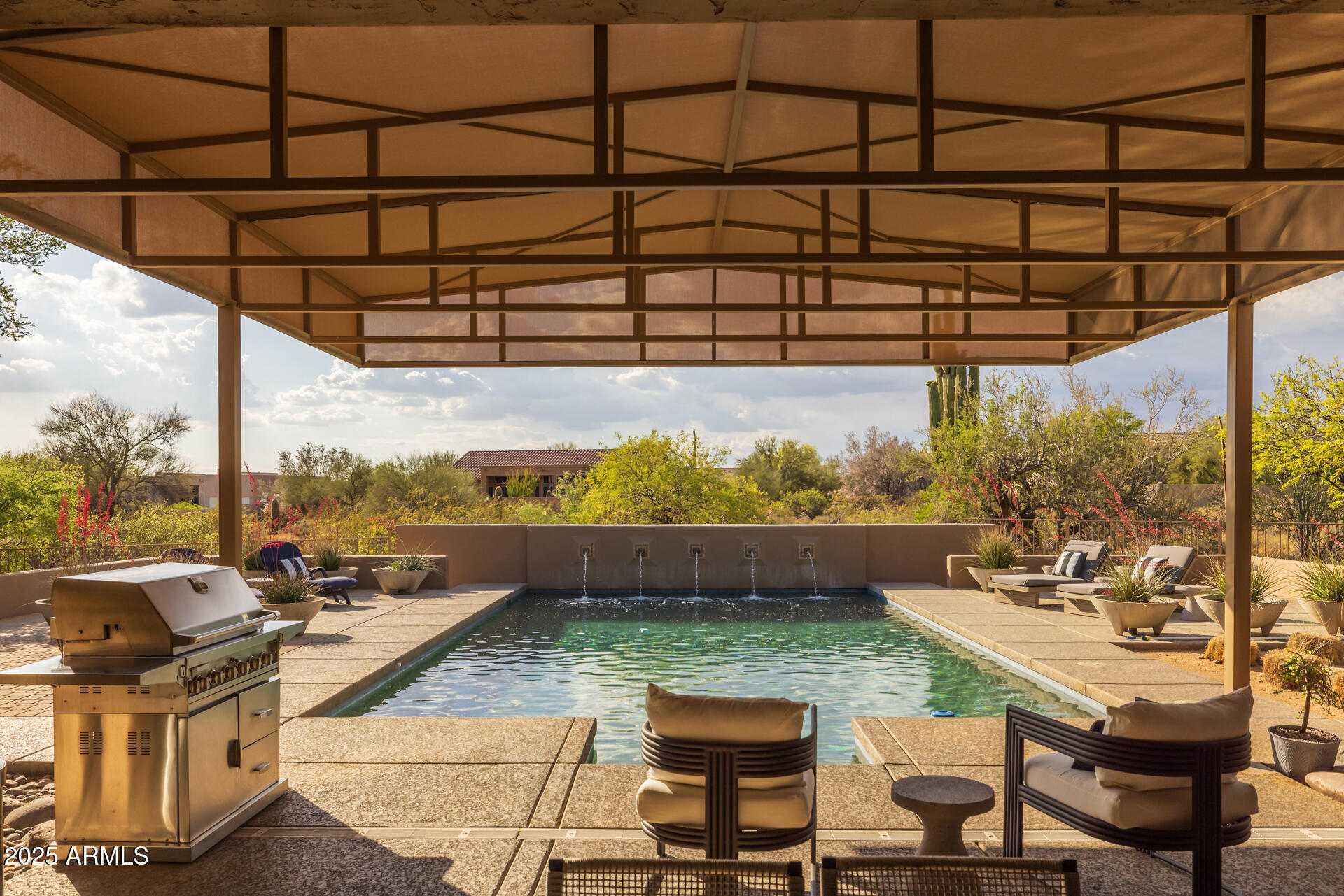 7474 East Red Bird Road Scottsdale, AZ 85266 - Photo 34 of 40 a view of a patio with couches table and chairs