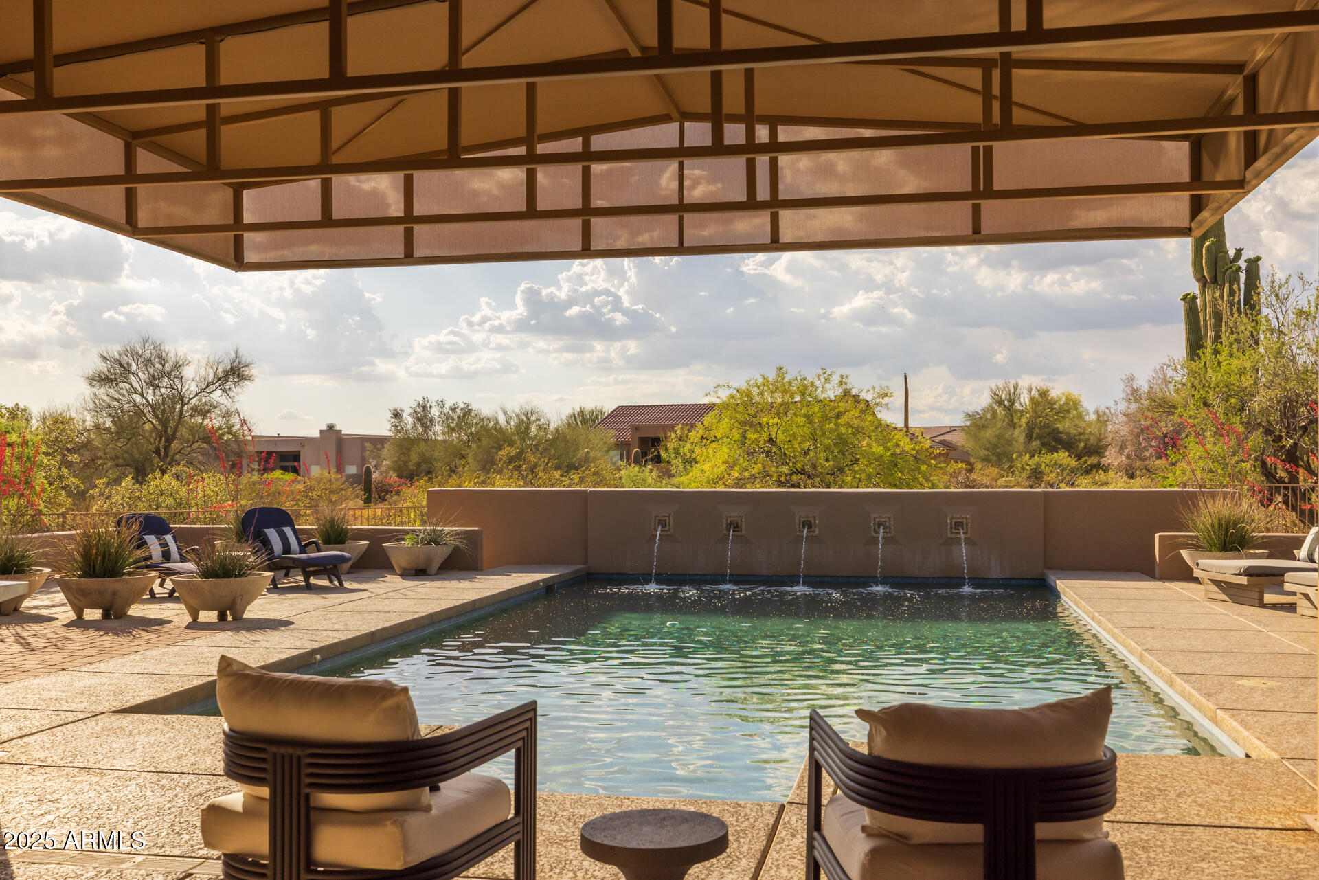 7474 East Red Bird Road Scottsdale, AZ 85266 - Photo 35 of 40 a view of a swimming pool with a patio