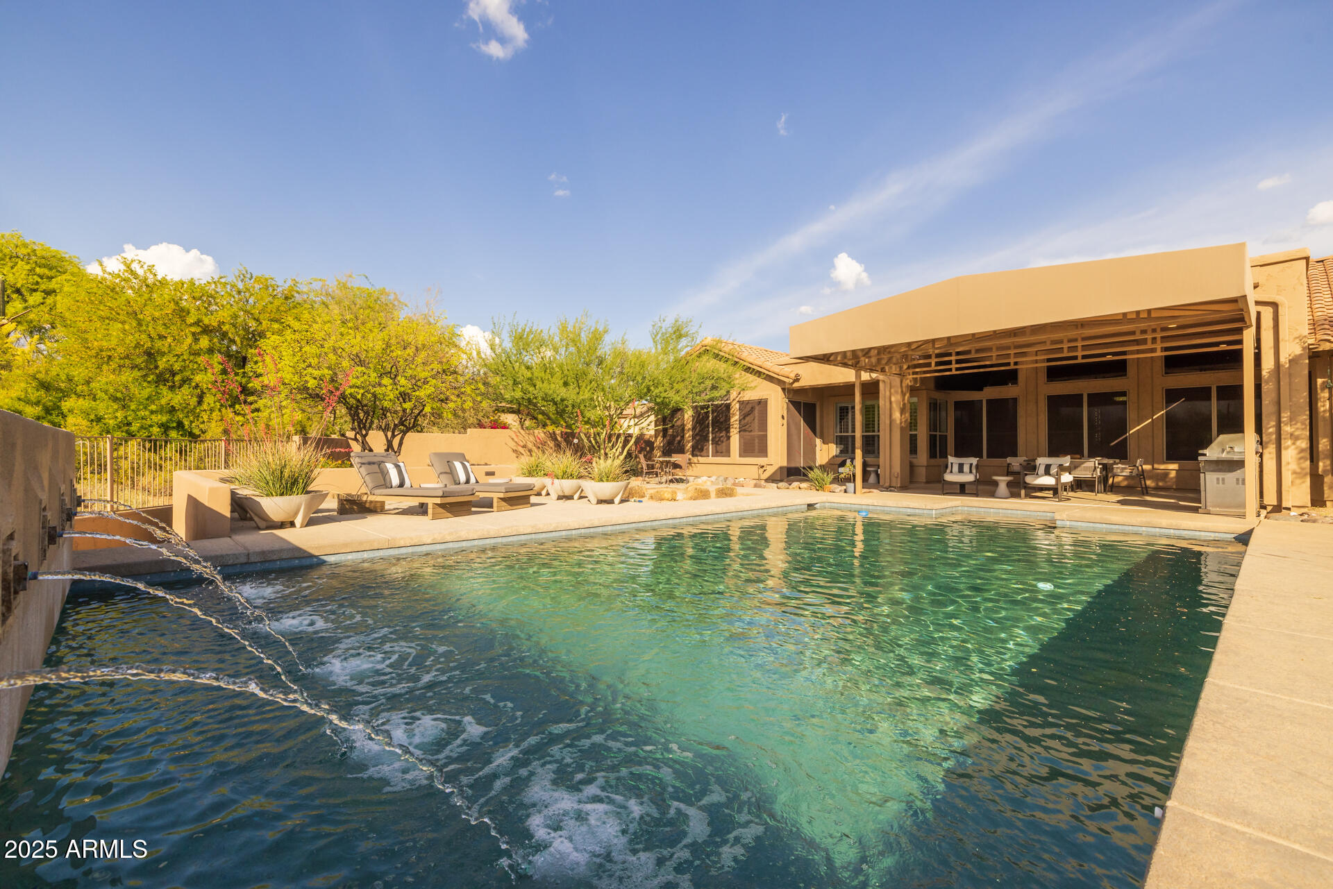 7474 East Red Bird Road Scottsdale, AZ 85266 - Photo 39 of 40 a swimming pool with outdoor seating and yard