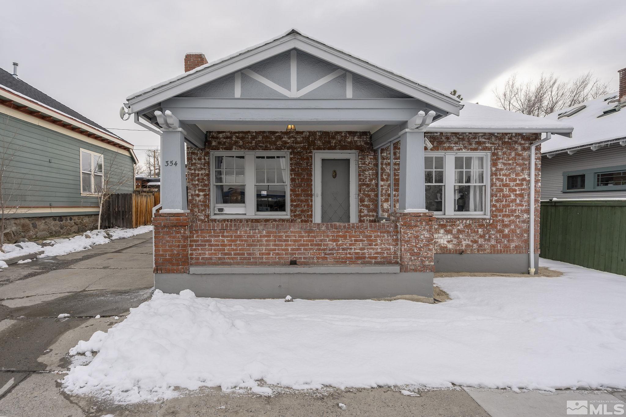 354 West Liberty Street Reno, NV 89501 - Photo 1 of 16 a front view of a house with a yard