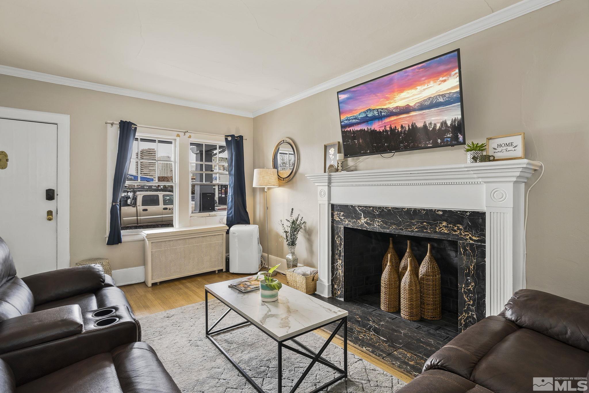 354 West Liberty Street Reno, NV 89501 - Photo 4 of 16 a living room with furniture and a fireplace