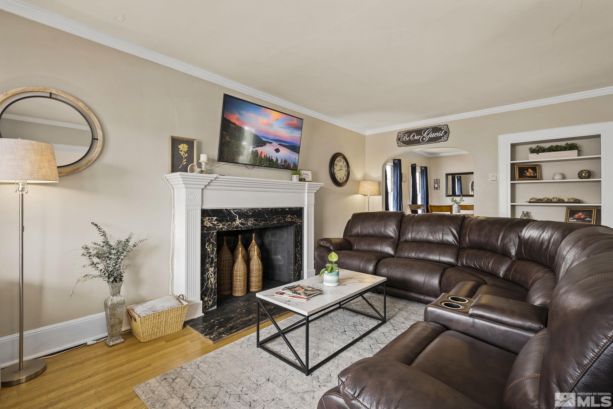 354 West Liberty Street Reno, NV 89501 - Photo 5 of 16 a living room with furniture and a fireplace