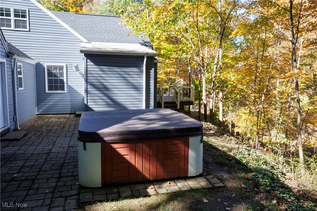 36625 Jackson Road Chagrin Falls, OH 44022 - Photo 11 of 50 View of patio / terrace with a wooden deck and a hot tub