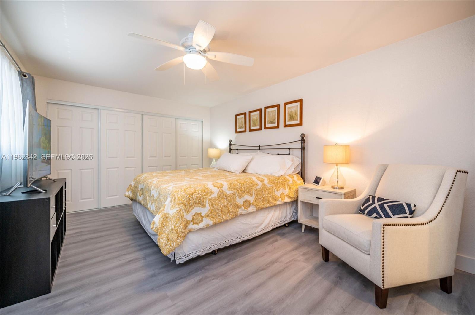 4702 Southwest 67th Avenue, Unit O7 Miami, FL 33155 - Photo 12 of 32 a bedroom with a bed and window