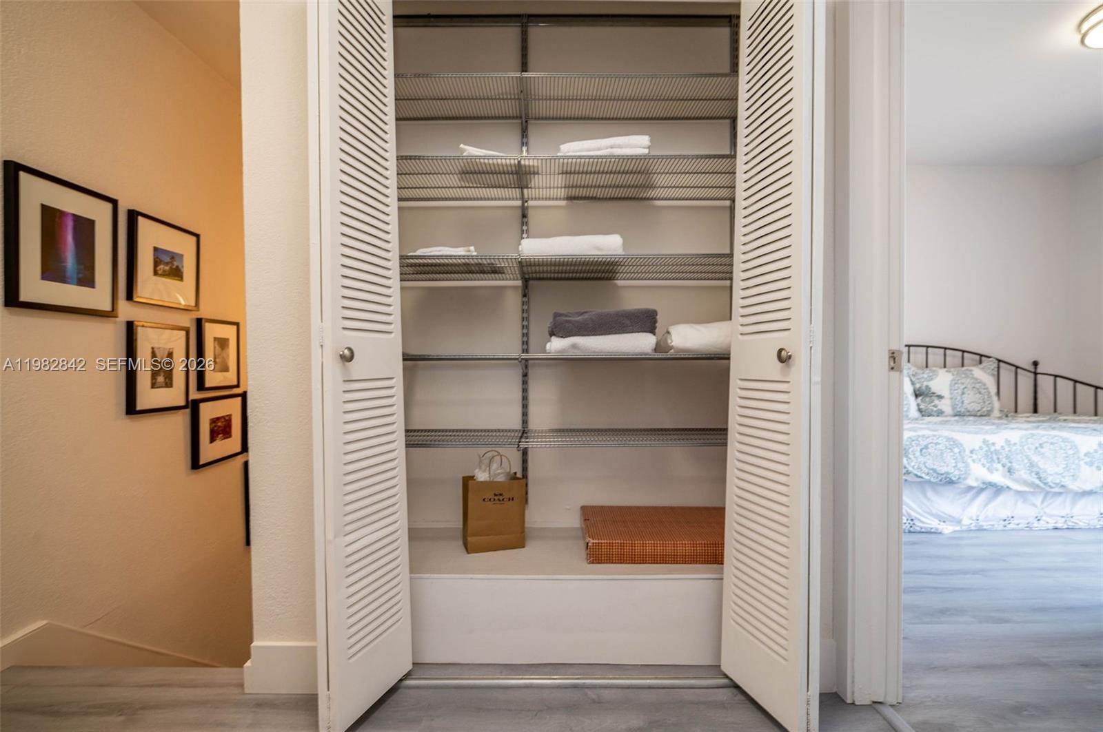 4702 Southwest 67th Avenue, Unit O7 Miami, FL 33155 - Photo 24 of 32 a view of storage and utility room