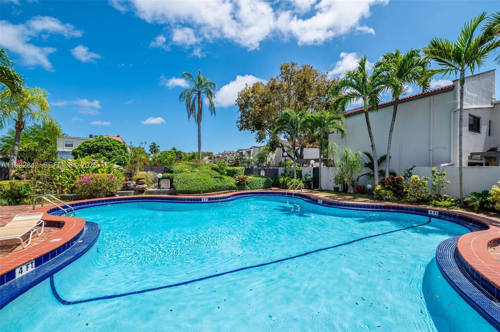 4702 Southwest 67th Avenue, Unit O7 Miami, FL 33155 - Photo 29 of 32 a view of a backyard