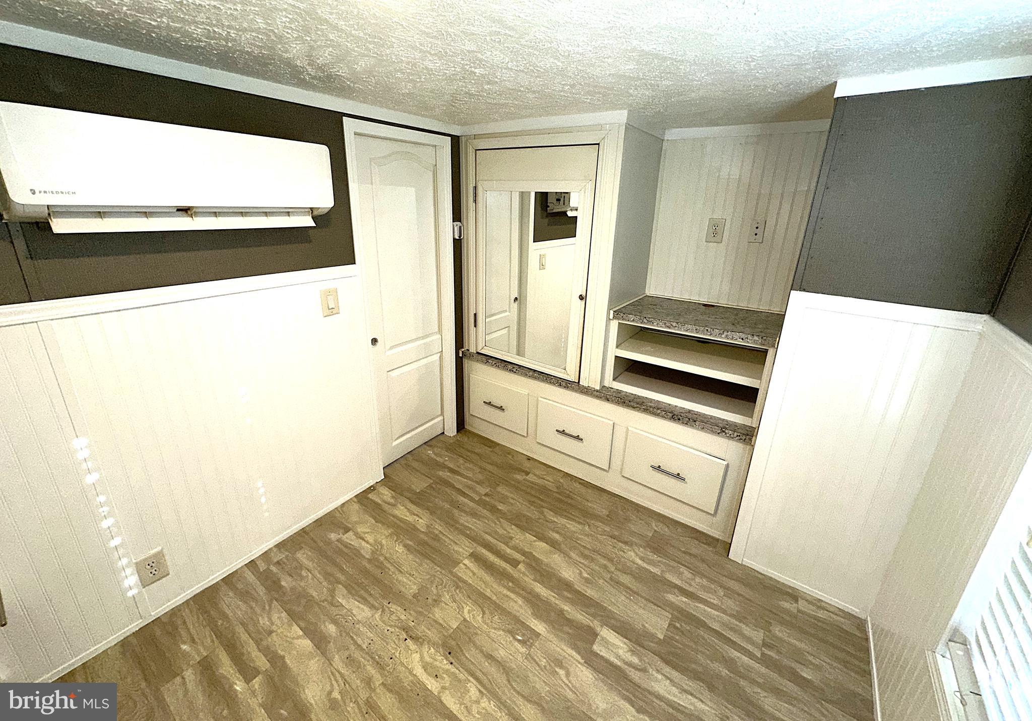 56 3rd Street Lothian, MD 20711 - Photo 15 of 25 a view of kitchen with wooden floor