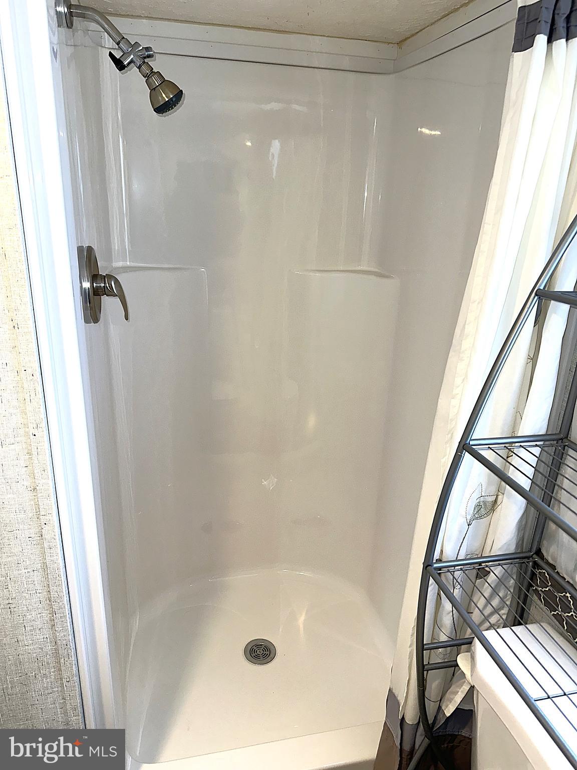 56 3rd Street Lothian, MD 20711 - Photo 18 of 25 a bathroom with a shower