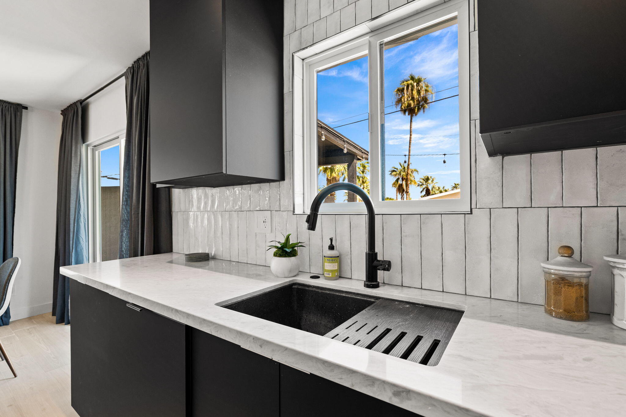 68175 Terrace Road Cathedral City, CA 92234 - Photo 18 of 53 a kitchen that has a sink and a stove in it