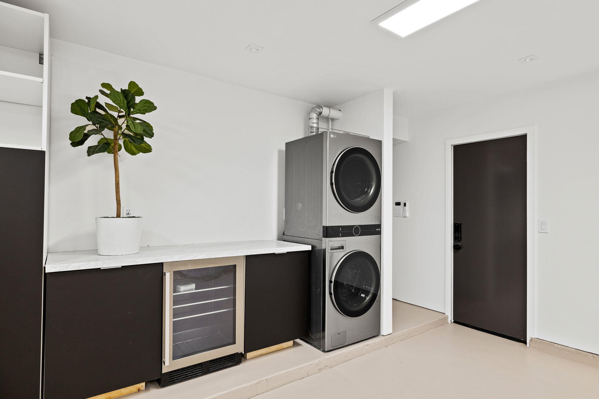 68175 Terrace Road Cathedral City, CA 92234 - Photo 2 of 53 a utility room with stainless steel appliances washer and dryer