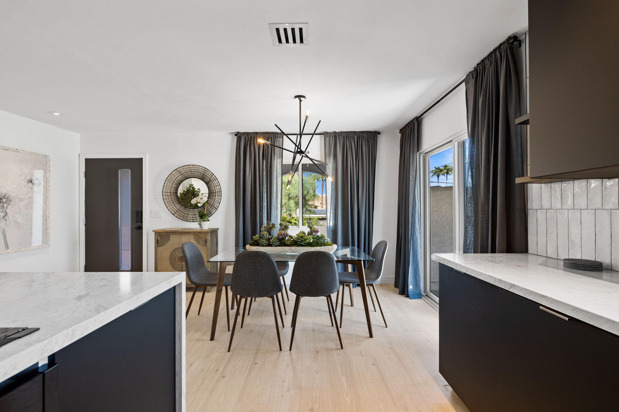 68175 Terrace Road Cathedral City, CA 92234 - Photo 21 of 53 a living room with furniture and a large window