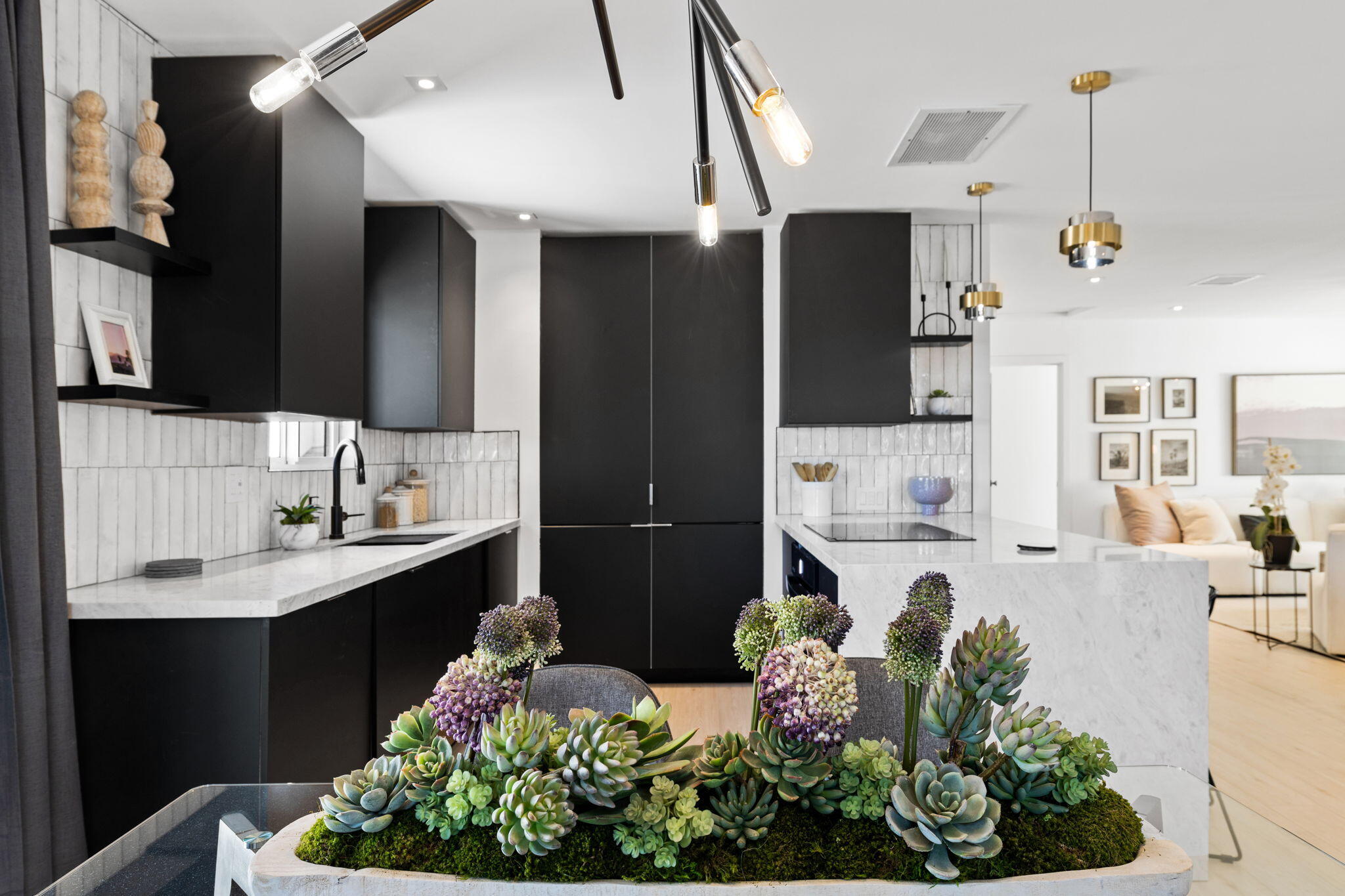 68175 Terrace Road Cathedral City, CA 92234 - Photo 23 of 53 a kitchen with stainless steel appliances kitchen island granite countertop a sink and a refrigerator