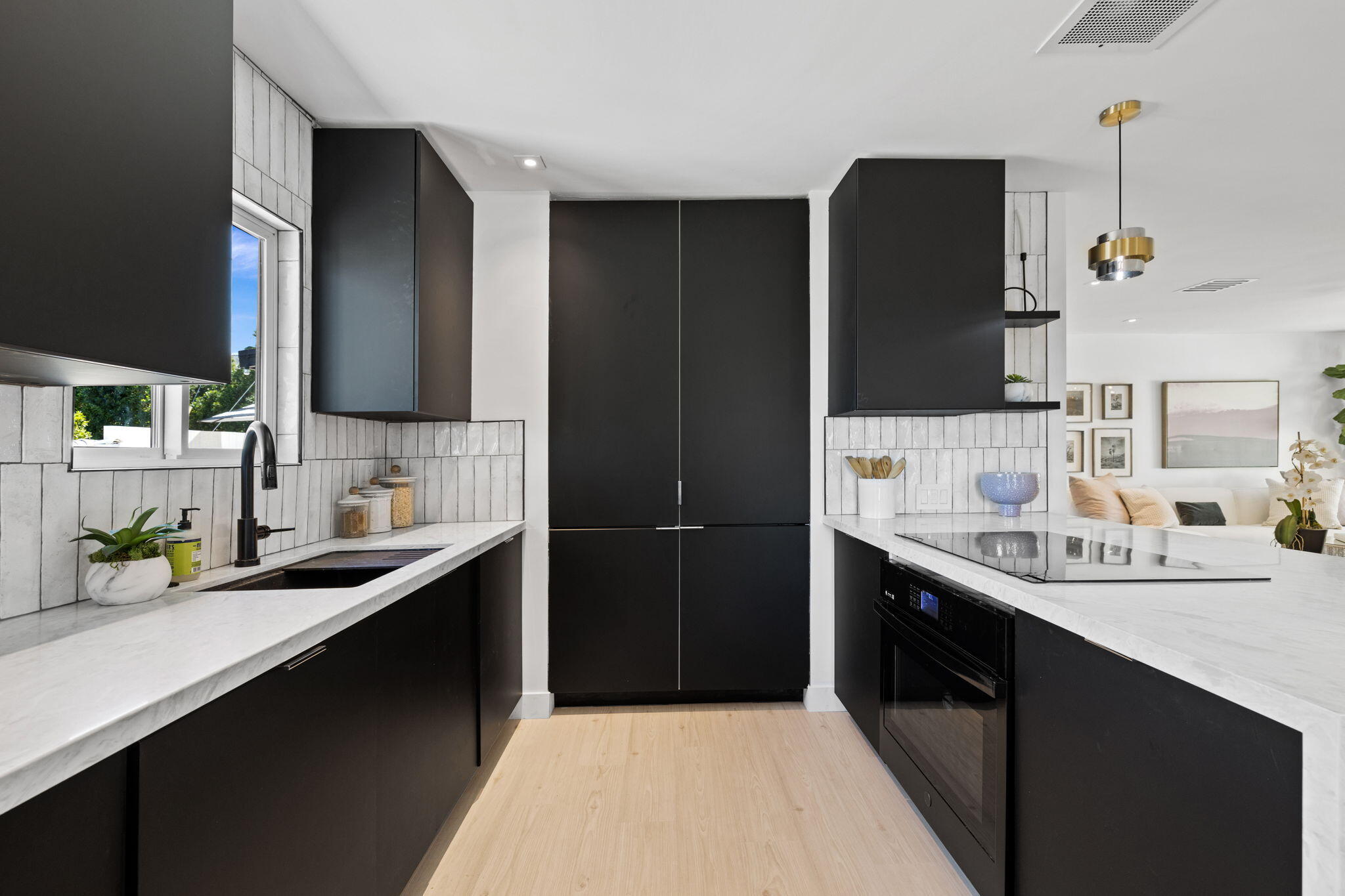68175 Terrace Road Cathedral City, CA 92234 - Photo 25 of 53 a kitchen with a sink and a refrigerator