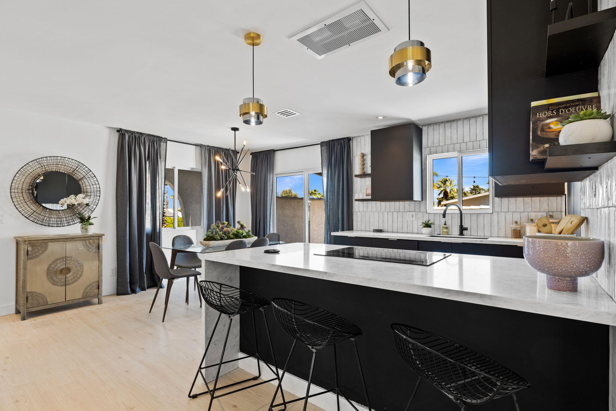 68175 Terrace Road Cathedral City, CA 92234 - Photo 27 of 53 a kitchen with a table chairs and microwave