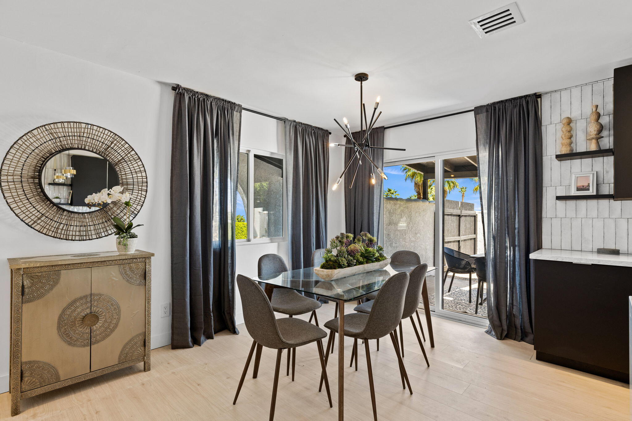 68175 Terrace Road Cathedral City, CA 92234 - Photo 28 of 53 a dining room with furniture and window