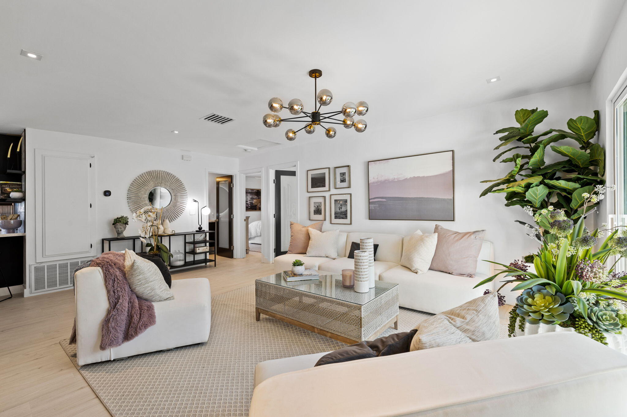 68175 Terrace Road Cathedral City, CA 92234 - Photo 32 of 53 a living room with furniture a chandelier and a window