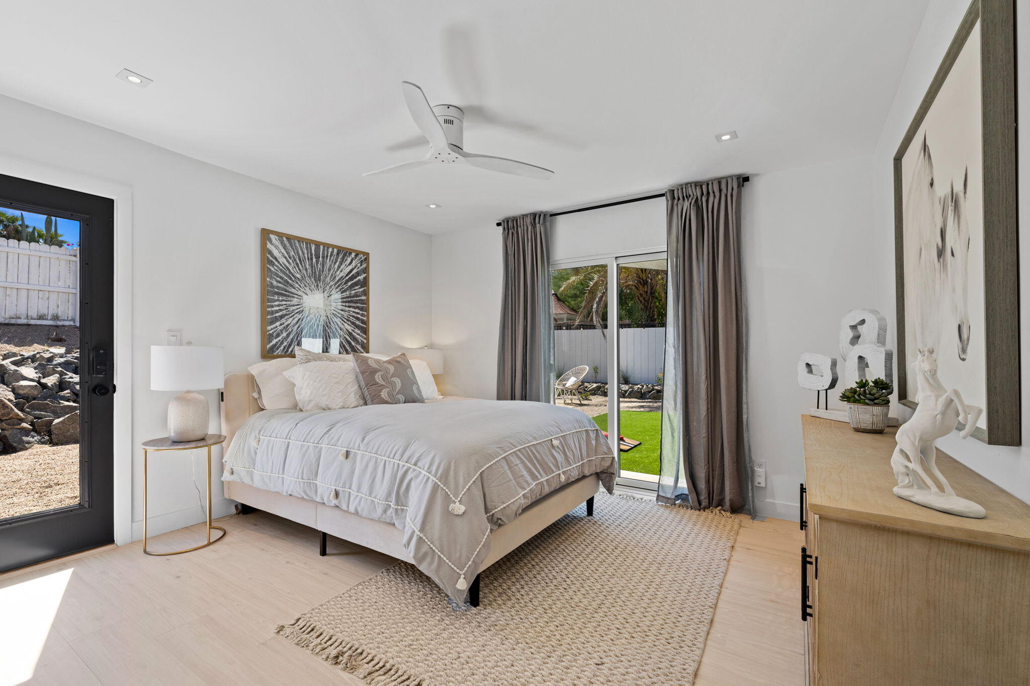 68175 Terrace Road Cathedral City, CA 92234 - Photo 36 of 53 a bedroom with a bed and a couch