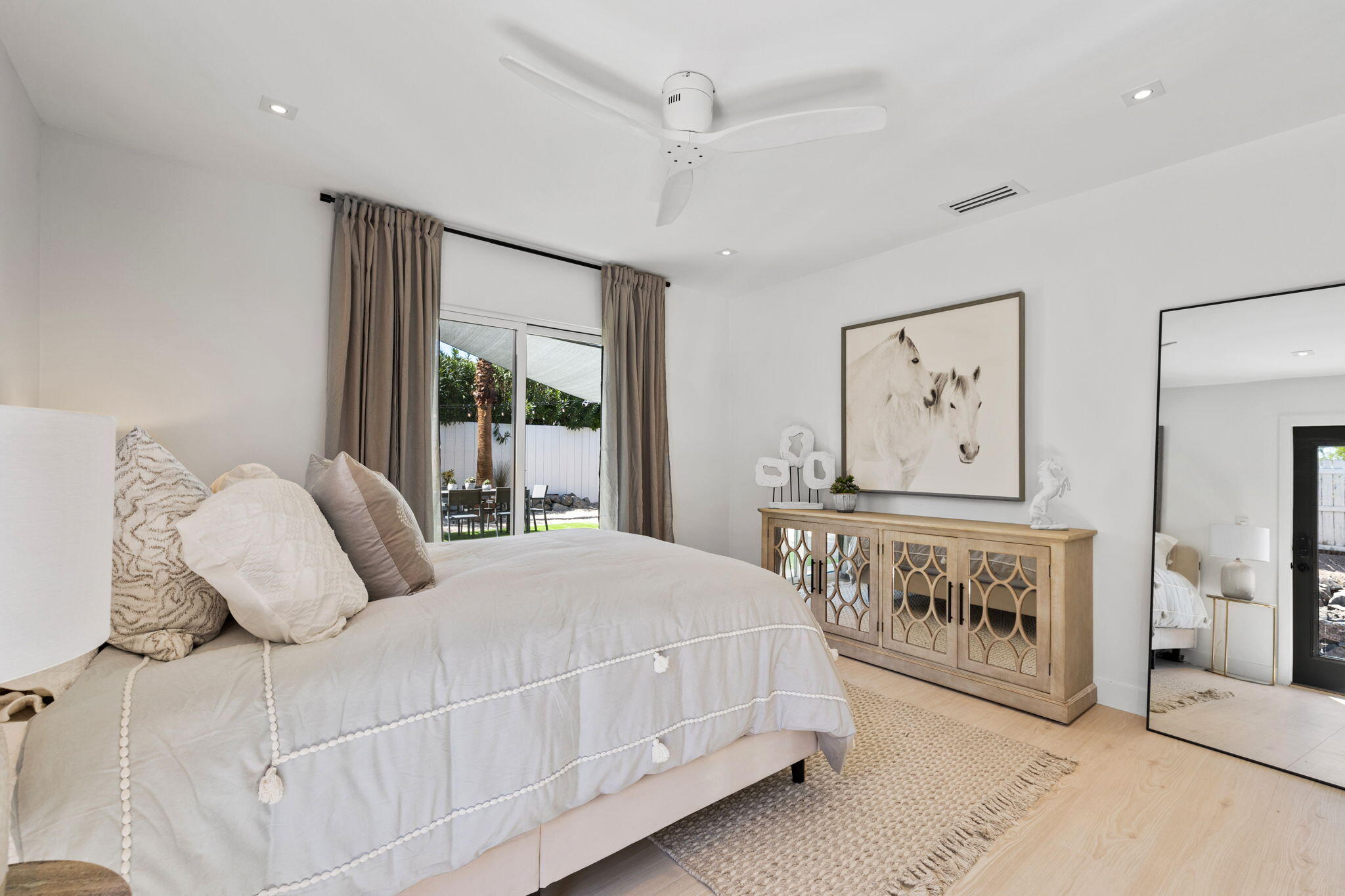 68175 Terrace Road Cathedral City, CA 92234 - Photo 37 of 53 a bedroom with a large bed and a window