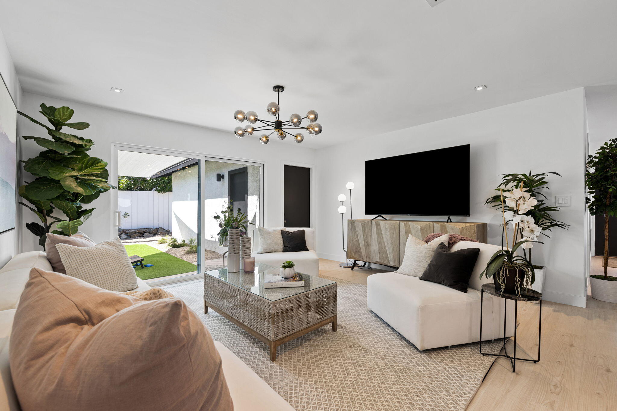 68175 Terrace Road Cathedral City, CA 92234 - Photo 39 of 53 a living room with furniture and a flat screen tv