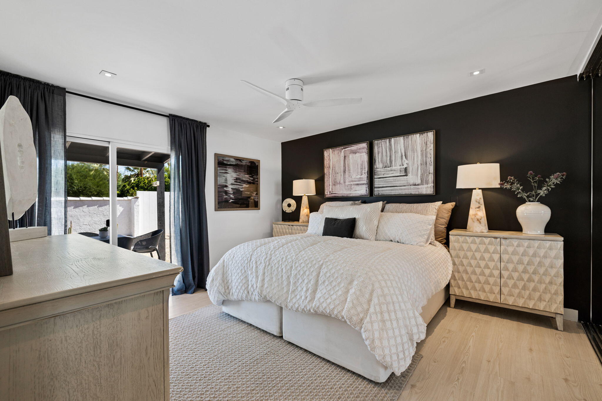 68175 Terrace Road Cathedral City, CA 92234 - Photo 49 of 53 a bedroom with a large bed and a dresser