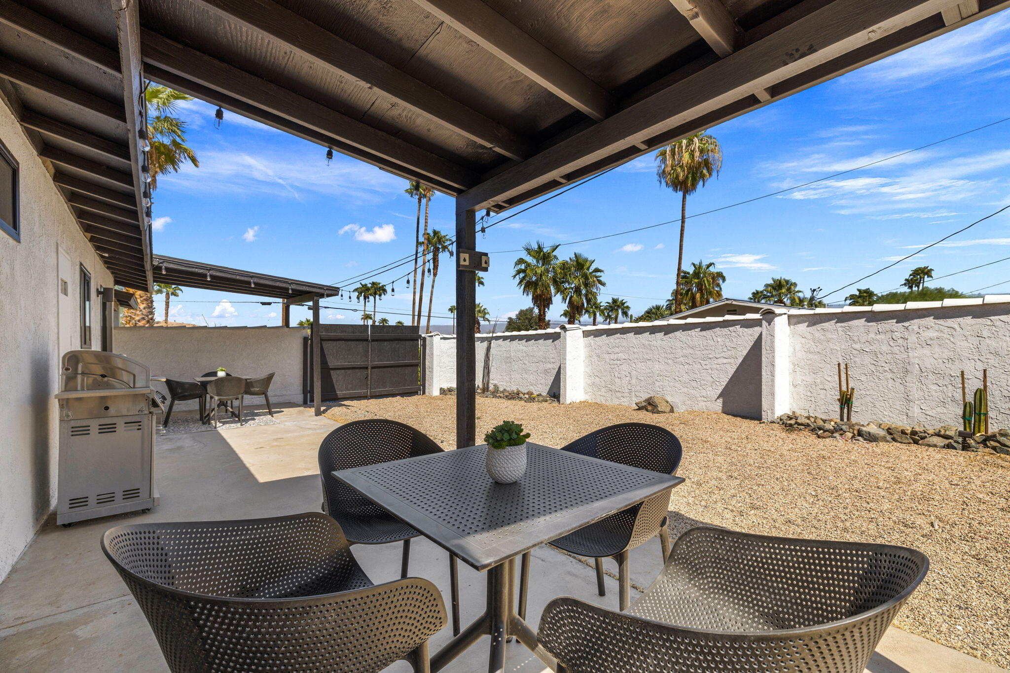 68175 Terrace Road Cathedral City, CA 92234 - Photo 5 of 53 a kitchen with a table and chairs