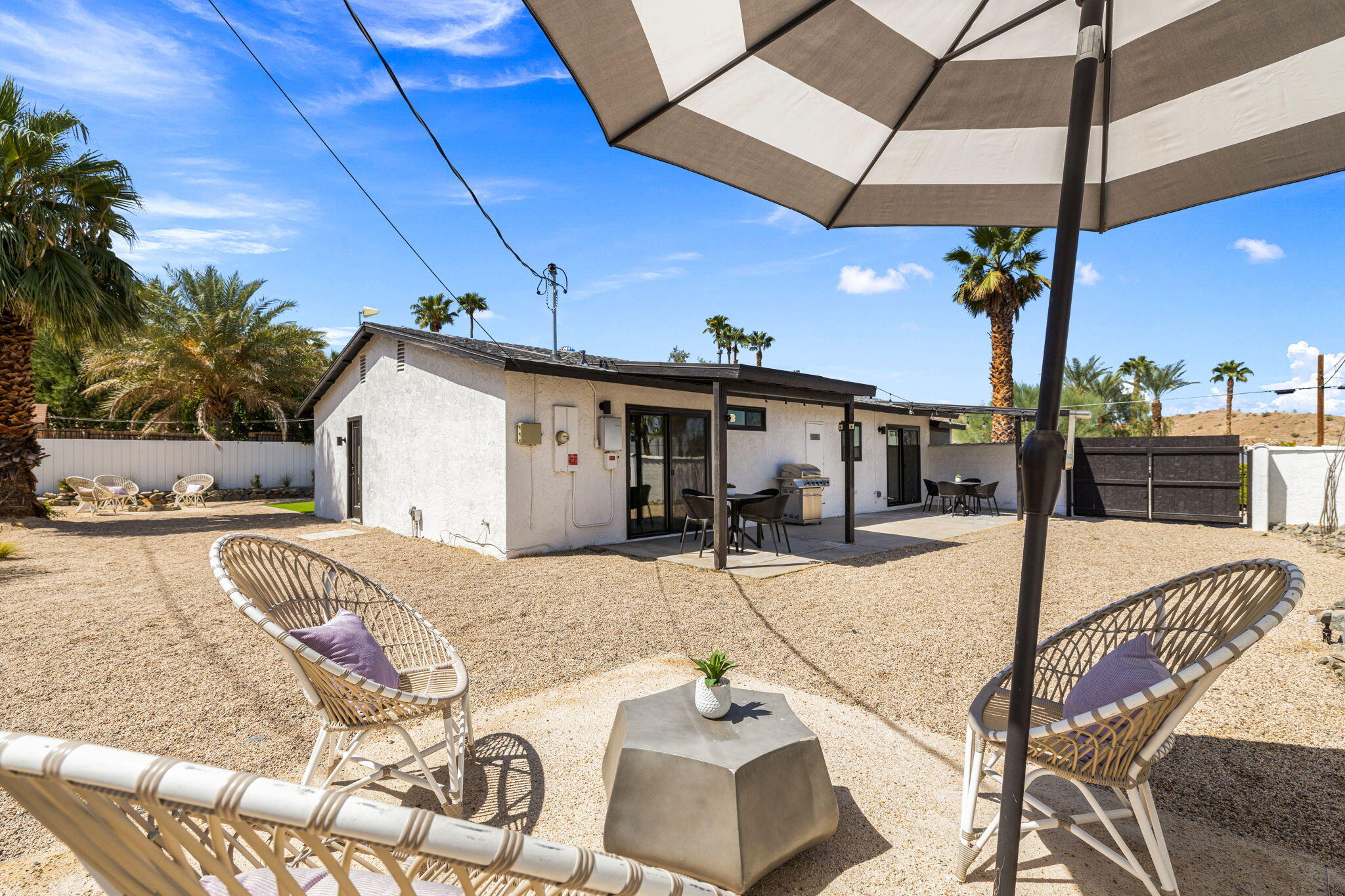 68175 Terrace Road Cathedral City, CA 92234 - Photo 6 of 53 a view of a house with backyard and sitting area