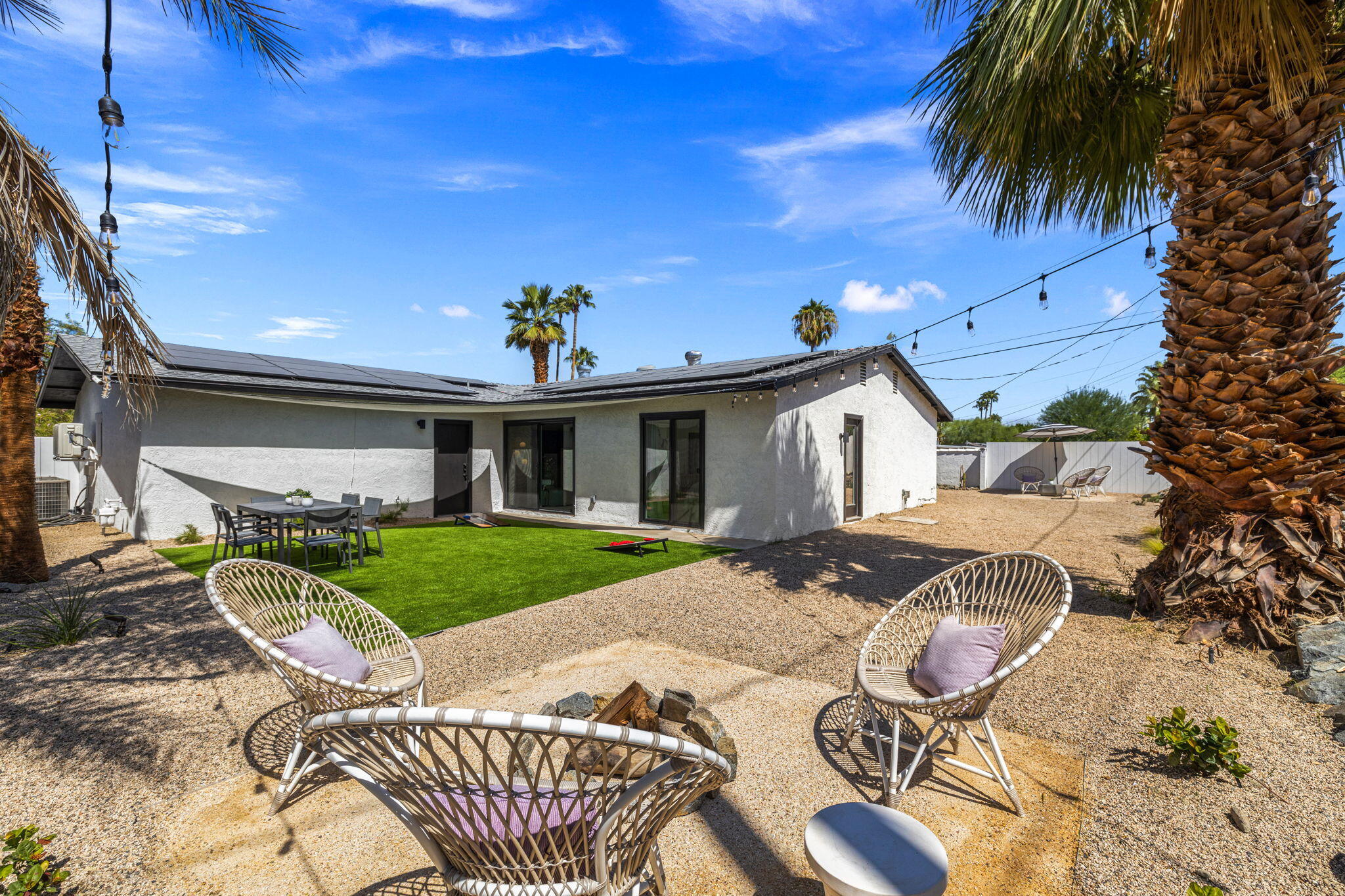 68175 Terrace Road Cathedral City, CA 92234 - Photo 10 of 53 a view of a house with backyard and sitting area