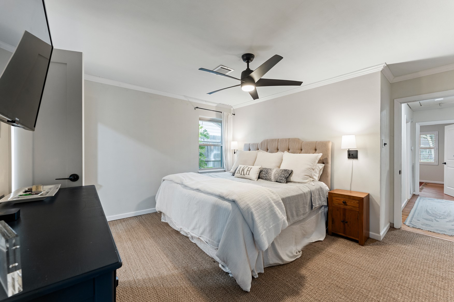 4610 Lido Lane Houston, TX 77092 - Photo 8 of 19 a bedroom with a bed tv and a window