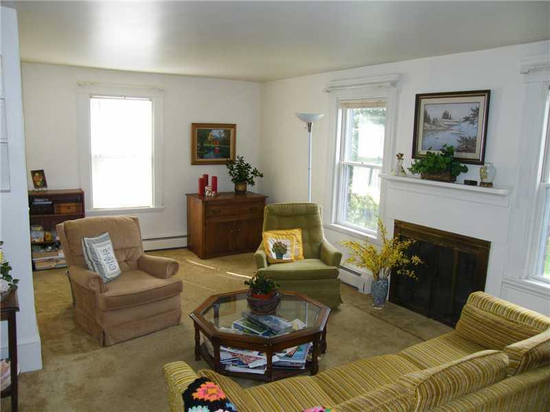 13 West Side Road South Bristol, ME 04568 - Photo 5 of 13 Living Room. Living room with wood...