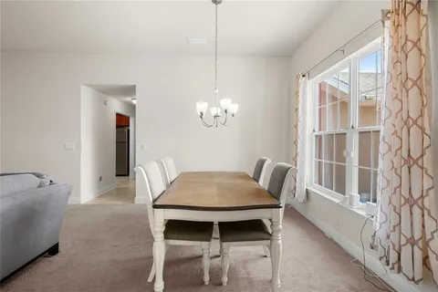 a view of livingroom with furniture and window