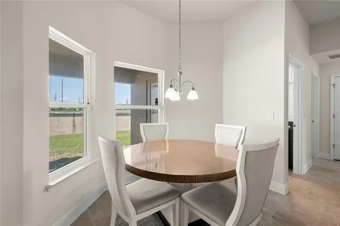 a kitchen with stainless steel appliances granite countertop a stove microwave and sink