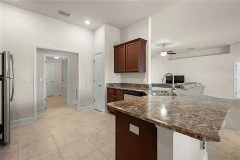 a bathroom with a toilet and a bathtub