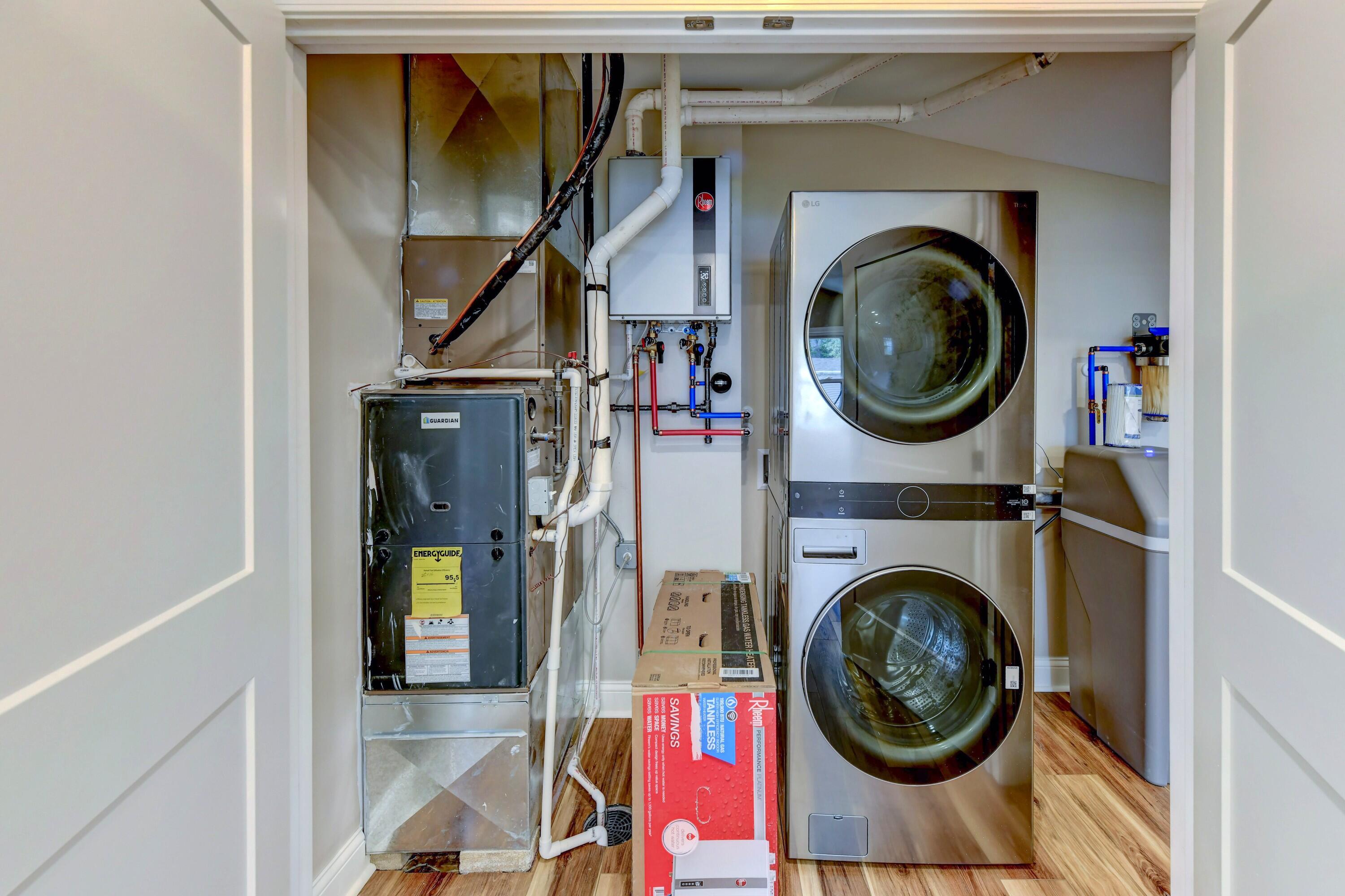 3908 West 127th Place Crown Point, IN 46307 - Photo 15 of 18 a view of a hallway with washer and dryer