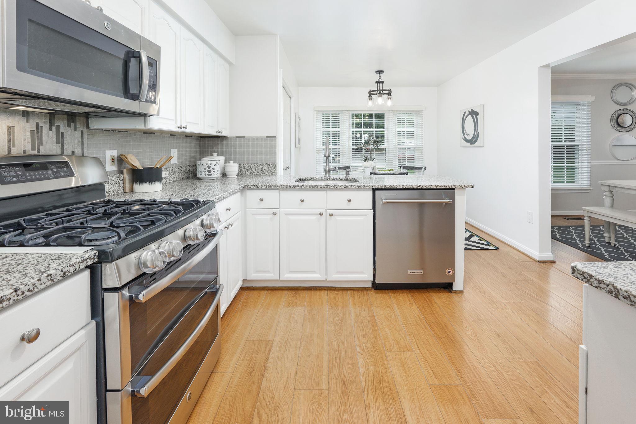 7210 Olde Lantern Way Springfield, VA 22152 - Photo 22 of 52 New Paint in Eat-in Kitchen w/ Granite Countertop