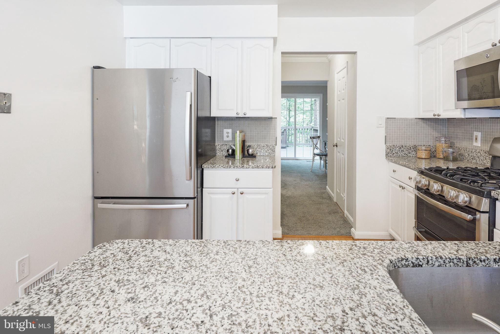 7210 Olde Lantern Way Springfield, VA 22152 - Photo 23 of 52 New Paint in Eat-in Kitchen w/ Granite Countertop