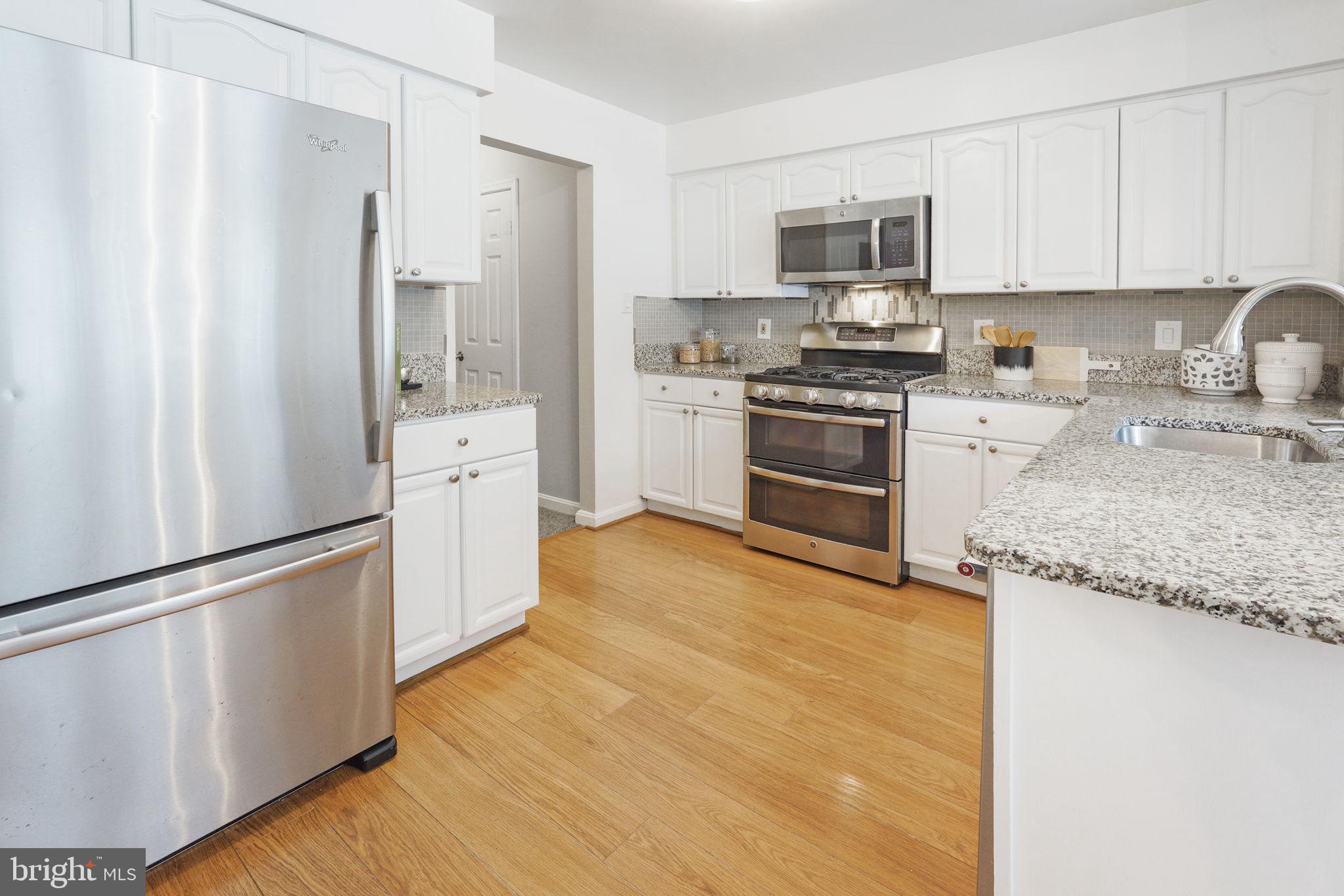 7210 Olde Lantern Way Springfield, VA 22152 - Photo 24 of 52 New Paint in Eat-in Kitchen w/ Granite Countertop
